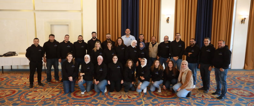 menaitech employees engage in building teams through values workshop